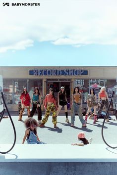 a group of people standing in front of a record shop with the words recordshop on it