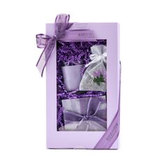 A Sonoma Lavender - Lavender Treatment Gift Set displayed in a windowed box, featuring a mug, candles, bath items including lavender essential oil, and adorned with a matching ribbon. Lavender Gifts, Essential Oils Gifts, Spring Event, Lavender Sachets, Votive Candle, Lavender Essential Oil, Votive Candles, Ready Made, Hostess Gifts