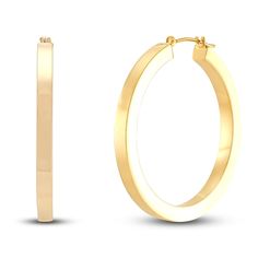 Dynamic square tubes are polished to a high shine in these stylish women's hoop earrings. Fashioned in 14K yellow gold, the earrings secure in place with hinged backs. Yellow Gold Rectangular Hoop Earrings For Anniversary, Rectangular Yellow Gold Hoop Earrings For Anniversary, Modern Rectangular Hoop Earrings For Anniversary, Modern Gold Hinged Hoop Earrings, Yellow Gold Shiny Finish Hoop Earrings, Modern Yellow Gold Brass Hoop Earrings, Modern Square Yellow Gold Hoop Earrings, Modern Gold Hoop Earrings With Gold-tone Hardware, Polished Yellow Gold Brass Hoop Earrings