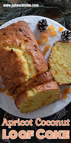 an apricot coconut loaf cake on a white plate with pine cones around it