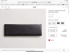 a website page with an image of a piece of black material on the bottom right corner