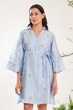 Powder blue kimono sleeves collared shirt dress with all over ditsy daisy embroidery and belted waist. Paired with a cotton inner dress. - Aza Fashions Spring Embroidered Relaxed Fit Dress, Spring Cotton Shirt Dress With Spread Collar, Spring Daywear Shirt Dress With Spread Collar, Spring Shirt Dress With Spread Collar, Spring Shirt Dress With Spread Collar For Daywear, Spring Cotton Dress With Floral Embroidery, Spring Cotton Shirt Dress For Work, Spring Brunch Shirt Dress With Relaxed Fit, Spring Brunch Relaxed Shirt Dress