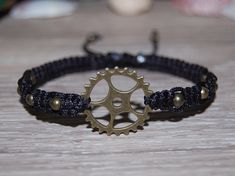 "Steampunk Bracelet,Gear Wheel Charm Bracelet,Cogwheel,Unisex,Bicycle Sprocket Bracelet,Cycling Gear Bracelet,Drawstring Bracelet,Men,Women The bracelet in the picture shown is 7\" size which fits an average wrist, please select your size from the drop down menu at checkout I will custom make your order, any questions please feel free to contact message me anytime, thank you very much. * * * * * * * * * * * * * * * * * * * * * * * * * * * * * * * * * * CHOOSING SIZE: Sizes are actual wrist measu Wheel Bracelet, Crafting Activities, Purple Crystal Bracelet, Mens Choker Necklace, Surfer Jewelry, Steampunk Bracelet, Steampunk Leather, Gear Wheels, Purple Bracelet