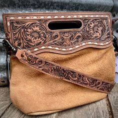 genuine leather tooled crossbody strap carry as a crossbody or clutch 12in X 14in Hand Tooled Crossbody Satchel, Wallet Ideas, Custom Leather Work, Leather Patterns, Bull Horns, Leather Ideas, Leather Workshop, Leather Projects, Tool Bag