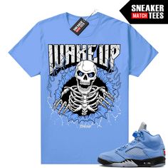 "UNC 5s Jordan matching shirt by Sneaker Match Tees brand. Official Sneaker Match Tees shirt designed to match the Jordan 5 \"UNC\" retro sneakers. *Sneakers are for matching purposes only, NOT included in the sale* True to size Men's shirt 100% Soft Cotton Regular Fit" Unc Blue 5s Outfit, Jordan 5 Unc Outfit Men, Unc 5 Outfit, Blue Sports Sneakers With Graphic Print, Blue Graphic Print Sports Sneakers, Blue Sneakers With Graphic Print For Streetwear, Blue Graphic Print Sneakers For Streetwear, Blue Casual Sneakers With Graphic Print, Casual Blue Sneakers With Graphic Print