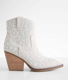 Very G Kady Glitz Western Ankle Boot - White US 6-1/2, Women's Silver Faux pearl and rhinestone faux suede bootie Side zip detail Cushioned footbed 7 1/2 shaft 3 1/4 heel. Upper: Fabric. Outsole: TPR.. WOMEN'S SHOE SIZE CONVERSION CHART US 5 5.5 6 6.5 7 7.5 8 8.5 9 9.5 10 11 12 EU 35-36 36 36-37 37 37-38 38 38-39 39 39-40 40 40-41 41-42 42-43 UK 3 3.5 4 4.5 5 5.5 6 6.5 7 7.5 8 9 10 *Conversion sizes may vary. Available in whole and half sizes. Apparel & Accessories > Shoes White Glitter Cowboy Boots, Pearl Cowboy Boots, Wedding Cowboy Boots For Bride, Sparkly Cowgirl Boots, Bridal Cowboy Boots, Western Wedding Boots, Bride Boots, Short Western Boots, Bride Sneakers