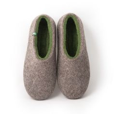 Wool clogs for men, Felted wool slippers made from mountain sheep wool on the outside and soft olive green merino in the interior. An ecological pair of Wooppers house slippers warm cosy and comfortable. Felt clogs which are insulating, breathable and dirt repellent is the best gift for men. SIZES WE NEED TO KNOW YOUR SIZE WITH YOUR ORDER. We make all sizes from men's EU 40 - UK 6 - US 7 up to EU 46 - UK 11 - US 12. Do not order bigger size than your normal moccasins. Ideally drop us a note with Green Comfortable Slippers With Textured Footbed, Green Outdoor Slippers With Round Toe, Green Round Toe Outdoor Slippers, Green Slip-on Outdoor Slippers, Green Outdoor Slip-on Slippers, Green Slip-on Winter Slippers, Outdoor Cozy Slippers With Rubber Sole, Cozy Outdoor Slippers With Rubber Sole, Green Closed-toe Winter Slippers