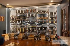 a wine cellar filled with lots of bottles