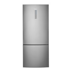 a silver refrigerator freezer sitting on top of a white wall