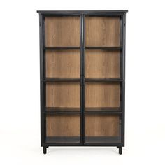 a black and wood bookcase with four shelves