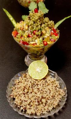 two bowls filled with food sitting on top of a table