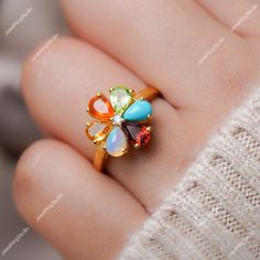 Gemstone : Natural Multi Gemstone (Garnet,Peridot,Turquoise,Fire Opal,Ethiopian Opal,Citrine) Metal : 14K White Gold / 14K Rose Gold / 14K Yellow Gold / 925S Silver Gemstone Shape and Size : Pear 6x4 MM Gemstone Weight : 2.80 Ctr Metal Weight :  3.30 Gram ACCEPT CUSTOM SERVICE 1. Accept change main stone type, size :  Pear 6x4 MM 2. Accept change other material : This jewelry can also be made in solid gold (14K white/rose/yellow gold...) Please contact me if you have special requests. Thanks for your visiting! Multicolor Gemstone Cluster Ring, Fine Jewelry Multicolor Multi-stone Opal Ring, Multicolor Multi-stone Opal Ring, Multicolor Cluster Wedding Ring, Fine Jewelry Multi-stone Flower Promise Ring, Multicolor Gemstone Ring For Wedding, Multicolor Gemstone Cluster Ring In Fine Jewelry Style, Multicolor Gemstone Cluster Ring Fine Jewelry, Fine Jewelry Multi-stone Flower Ring Gift