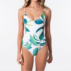 Rip Curl Palm Bay Good One Piece Swimsuit In Size Small Tropical White One-piece Swimwear, White Floral Print Bodysuit For Poolside, White Printed One-piece Swimwear, Tropical White Bodysuit For Pool, Tropical White Bodysuit For The Pool, Tropical White Sleeveless Bodysuit, White Floral Print Bodysuit For Vacation, White Printed Summer Bodysuit, Beach White Printed Bodysuit