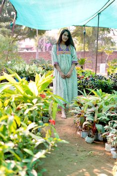 Introducing a beautiful fusion of Embroidery and Indian Hand-block printing Kaveri Midi Dress. A beautiful dress design to enhance every women's beauty. A must have in your wardrobe. This dress will keep you feeling and looking comfortable and fantastic. Simple and stylish design and pretty color make this dress beautiful as well as wearable. Model is wearing Size M. Product details -Fabric: 100% Cotton and Hand-block printed. -Embroidered patch is used on the bodice. -Dry clean or gentle hand wash. -Made In India. Own a Piece of Art Every dress for women of our store is a testament to the rich cultural heritage of Jaipur's block printing tradition. Our passion for this unique art form shines through in every detail. The intricate floral designs dresses tell a story, making your dress more Green Anarkali Dress For Summer, Green Printed Dresses For Spring, Green Dresses With Printed Motifs For Spring, Spring Green Dresses With Printed Motifs, Green Spring Dresses With Printed Motifs, Green Block Print Dresses For Spring, Green Straight Kurta With Printed Motifs, Green Straight Kurta Dress For Spring, Spring Green Dresses With Block Print