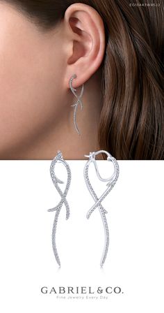 A branching trail of tapered pavé diamonds descends from each side of the ear in these showstopping drop earrings. The unique silhouette is crafted from cool 14k white gold and finished with radiant 0.70ct diamonds.   EG13443W45JJ  #GabrielNY #DiamondJewelry #FineJewelry #GabrielAndCo #UniqueJewelry#FineJewelry#FashionJewelry#UniqueJewelry#GiftIdeas#UniqueGifts #Earrings #FashionEarrings#WhiteGold Luxury Dangle Hoop Earrings For Formal Occasions, White Gold Diamond Earrings With Ear Wire, Luxury Wedding Earrings With Lever Back Ear Wires, Elegant Silver Wrap Earrings, Luxury Jewelry With Ear Wire For Formal Occasions, Luxury Lever Back Earrings For Anniversary, Luxury Formal Jewelry With Ear Wire, Elegant Wrap Earrings For Formal Occasions, Formal Fine Jewelry Diamond Earrings With Ear Wire