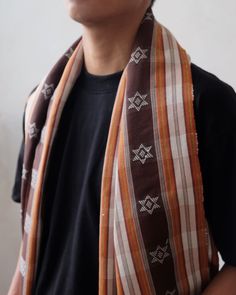 A medium-weight handwoven scarf from Kalinga, Philippines. Woven with beautiful geometric patterns inspired by nature. DETAILS Size: Approximately 68" x 23". Make: Handwoven polycotton blend made on backstrap looms in Kalinga, Philippines. Care: Hand wash and air dry. Read more about the weaving traditions in Luzon here. Brown Traditional Patterned Scarves, Bohemian Woven Cotton Scarves, Traditional Brown Cotton Scarf, Bohemian Brown Handwoven Scarves, Bohemian Brown Handwoven Scarf, Brown Bohemian Woven Scarf, Traditional Woven Cotton Shawl, Nature Details, Backstrap Loom