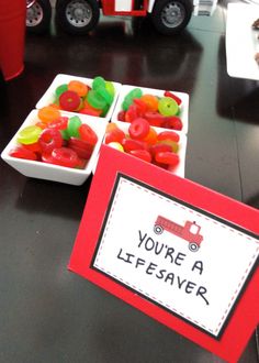 there is a sign that says you're a lifesaver next to some gummy bears