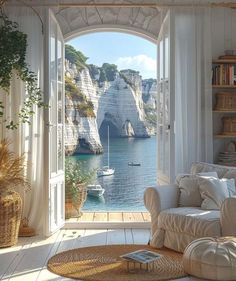 a living room with an open window overlooking the water