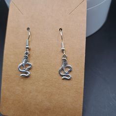 Very Detailed Little Snakes Nickel-free Casual Party Earrings, Casual Nickel-free Earrings For Party, Casual Metal Earrings With Ear Wire, Casual Metal Drop Earrings, Casual Metal Dangle Jewelry, Casual Silver Earrings For Party, Casual Metal Jewelry For Parties, Snake Earrings, Earrings Color