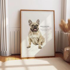 a dog is sitting on the floor next to a framed poster with his tongue out