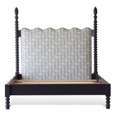 a bed frame with an intricate design on it