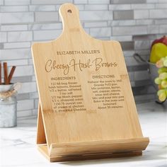 a wooden cutting board with an engraved recipe