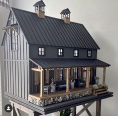 a model house is sitting on top of a table