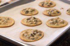 chocolate chip cookies on a baking sheet ready to go in the oven for bake