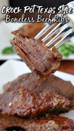 the fork is holding up some meat on top of another piece of steak, with text overlay