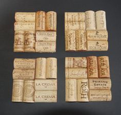 four wine corks are arranged on a table