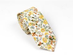 "Mint Yellow Floral Skinny Ties For Men, Wedding Ties For Men, Mens Skinny Floral Ties On Wedding Day, Floral Ties Yellow, Ties For Boy * 2.5\" at the widest point（please leave me notes if you want other size) * Approximately 58\" in Length * Handmade * 100% Cotton * Dry Clean only Vintage style floral print. This tie is suitable for weddings, proms, casual throw downs, dinner and all special occasions. This tie will certainly start the conversation with lots of compliments. Please note that due Summer Ties For Groom, Summer Wedding Ties For Groom, White Suit And Tie Accessories For Summer, White Summer Tie For Groom, White Ties For Groom In Spring, White Suit And Tie Accessories For Summer Wedding, White Suit And Tie Accessories For Groom In Summer, Wedding Ties For Men, Mens Floral Tie