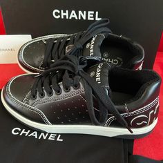 Authentic Brand New Chanel Sneakers In Black Calfskin, Size 36. Including: Box, 2 Dust Bags, A Chanel Booklet. True To Size. Luxury Black Sneakers With Embossed Logo, Luxury Black Sneakers With Perforations, Black Calf Leather Sneakers With Logo, Luxury Black Sneakers With Logo, Luxury Black Lace-up Sneakers, Designer Black Leather Sneakers, Elegant Black Calf Leather Sneakers, Black Sneakers For Streetwear, Stylish Black Sneakers For Streetwear