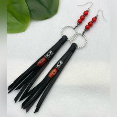 Unleash Your Inner Boho Spirit With These Handcrafted Red Coral Beads, Two Lentil Beads And Leather Fringe Earrings, A Perfect Blend Of Earthy Elegance And Playful Charm. Each Earring Features Approximately A 4-Inch Leather Tassel, Bound By Premium Metal Findings. Each Stone Measuring About 8mm Diameter. These Earrings Have A Total Drop Length Of 7 Inches, Ensuring A Dramatic Sway And A Touch Of Glamour With Every Movement. Ideal For Those Who Love To Make A Statement With Their Accessories, The Beaded Leather Earrings, Red Leather Jewelry For Party, Yarn Earrings, Leather Fringe Earrings, Earthy Elegance, Dramatic Earrings, Diy Leather Earrings, Jeans Bags, Rustic Earrings