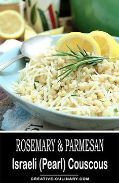 a close up of a plate of food with lemons and parmesan cheese