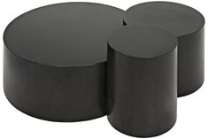 three black round tables sitting next to each other