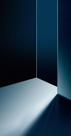 an open door in the middle of a dark room with light coming through and onto it