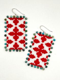 Hand beaded red and white earrings with turquoise details Traditional White Beaded Earrings For Gift, Artisan White Beaded Earrings With Dangling Beads, White Artisan Beaded Dangle Earrings, White Artisan Beaded Drop Earrings, White Handwoven Dangle Beaded Earrings, White Handwoven Beaded Dangle Earrings, White Handwoven Beaded Drop Earrings, White Handwoven Drop Earrings, Unique Handwoven Red Jewelry