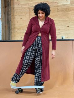 "1990s Vintage Minimalist Long Maroon Red Shirtwaist style dress or duster coat in a soft faux like brushed suede or velveteen. Looks smart and fierce. A good weight for a spring transition piece. Nice over jeans and a t-shirt or Rock on its very own as a dress. In very good condition. A couple of light rubs in the faux ultra. Not noticeable. May just be part of the mix. Tags: TriBeca Studios Bust 40\" Waist 38\" Hip 42\" Length 51\" Please message me with questions before purchasing. All sales Retro Burgundy Long Sleeve Outerwear, 90s Style Outerwear With Button Closure For Fall, 90s Style Fall Outerwear With Button Closure, 90s Fitted Outerwear With Pockets, Velvet Duster, Ladies Coat, Rose Print Dress, Winter Suit, Matching Sweaters