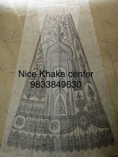 an advertisement for the nice khaka center in front of a wall with intricate designs on it