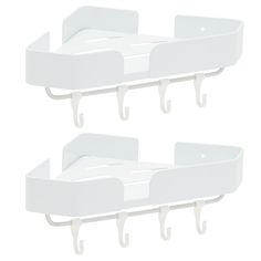 two white wall mounted baby cribs with hooks on each side and one attached to the wall