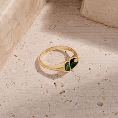 Discover the epitome of romantic elegance with our Green Enamel Heart Signet Ring. Crafted to perfection, this enchanting ring features a timeless heart signet design with vivid green enamel. Whether worn as a symbol of affection or as a chic statement piece, the Green Enamel Heart Signet Ring is a beautiful addition to any jewelry collection, offering a touch of grace and charm to every moment. - Made in 14k solid gold - Decorated with handset white cubic zirconia stone - Finished with Green En Fine Jewelry Green Heart Ring For May Birthstone, Green Heart Ring For May Birthstone, Fine Jewelry Style, Green Heart Ring For May Birthstone, Elegant Heart-shaped Green Emerald Ring, Elegant Green Heart-shaped Emerald Ring, Elegant Green Heart Promise Ring, Elegant Green Enamel Ring With Polished Finish, Elegant Enamel Signet Ring, Elegant Heart Ring With May Birthstone Gemstone