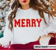 Our Chenille Patch Merry Christmas Sweatshirt is the coziest necessity for your holiday wardrobe! The perfect Christmas gift for women! This is our favorite holiday sweater to wear while running holiday errands or to cozy up in at home! *UNISEX SIZING - Tees and Sweatshirts are unisex, relaxed/loose fit *Ships within 5 business days from Delaware, USA Shop with Confidence! We are a 5-Star Rated Shop operating since 2015! HOW TO ORDER MULTIPLES: 1. Select your size in the drop down menu. 2. Click Unique Ugly Christmas Sweater, Christmas Gift For Women, Chenille Patch, Red Patch, Christmas Crewneck, Unique Holiday Gifts, Sweatshirt Fabric, Holiday Wardrobe, Clothes Sale