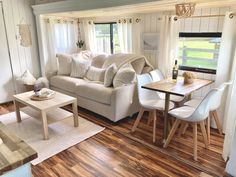 the living room is clean and ready to be used as a dining area or office