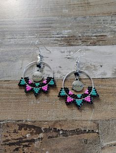 Believe black and hot pink beaded hoop earrings Pink Hoop Beaded Earrings For Festival, Black Dangle Hoop Earrings For Festivals, Nickel-free Pink Beaded Hoop Earrings, Pink Small Hoop Jewelry For Festival, Adjustable Round Black Beaded Earrings, Gift Black Hoop Earrings With Colorful Beads, Pink Small Hoop Beaded Earrings With Dangling Beads, Black Hoop Earrings With Colorful Beads As Gift, Black Hoop Earrings With Colorful Beads For Gift