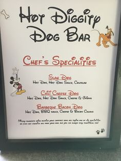 a sign for a dog bar on the floor