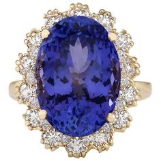 Indulge in luxury beyond compare with our remarkable 12.38 Carat Tanzanite Diamond Ring, meticulously crafted in 14 Karat Yellow Gold. Every aspect of this exquisite piece speaks to uncompromising quality and timeless elegance, from the distinguished 14K stamp affirming its authenticity to the delicate balance of gemstones that adorn its surface. At the heart of this captivating ring lies a breathtaking Tanzanite gemstone, boasting an impressive weight of 11.28 carats and measuring 16.00x12.00 m Elegant Gold Tanzanite Diamond Ring, Gia Certified Classic Evening Jewelry, Yellow Gold Tanzanite Diamond Ring With Halo Setting, Yellow Gold Diamond Ring With Tanzanite In Prong Setting, Luxury Tanzanite Diamond Ring Gia Certified, Luxury Gia Certified Tanzanite Diamond Ring, Elegant Yellow Gold Diamond Ring Gia Certified, Elegant Gia Certified Yellow Gold Diamond Ring, Luxury Tanzanite Yellow Gold Ring