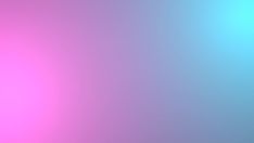 a blurry image of pink and blue colors