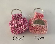 two small crocheted purses sitting next to each other