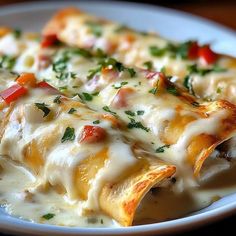 a close up of a plate of food with cheese