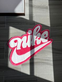 a rug with the word nike painted on it